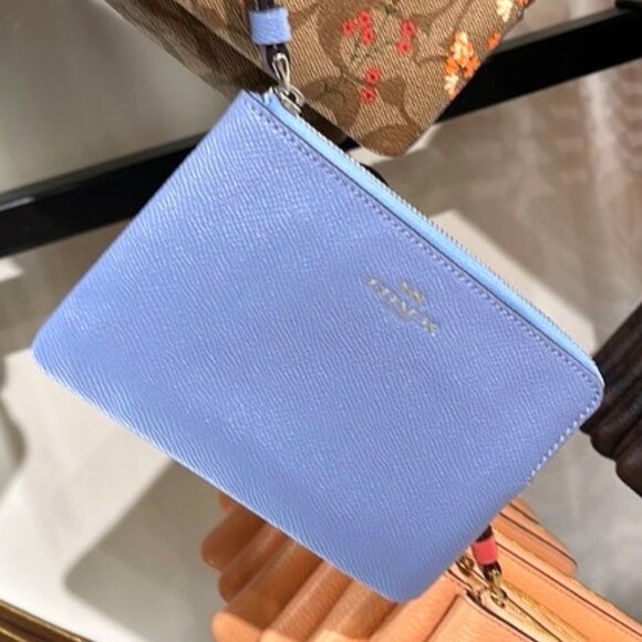 Coach Handbags - Coach Corner Zip Wristlet Silver / Marble Blue Leather